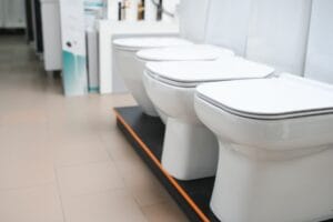 Toilet bowls in a home goods store.