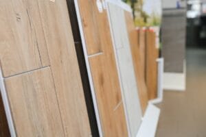 Large assortment of floor tiles or a selection at a hardware store. Repair material.